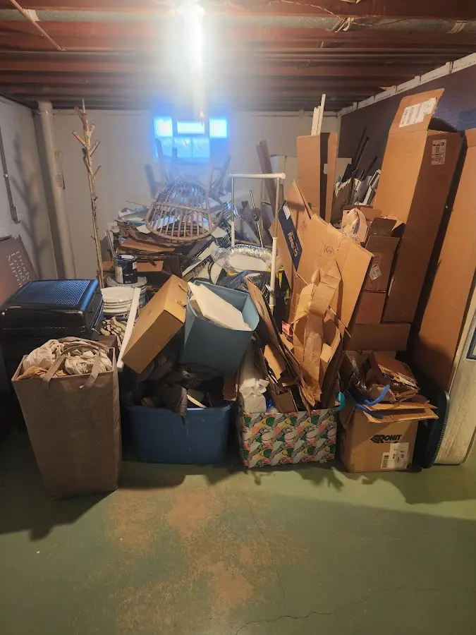 Roll-off dumpster container at job site for 2 Yard Dumpster Rental in Mount Healthy Heights